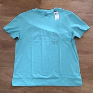 Teal blue polo shirt. Crew neck